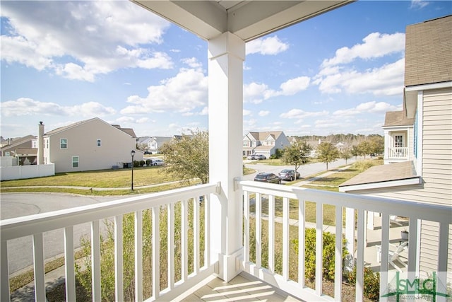 balcony featuring a residential view