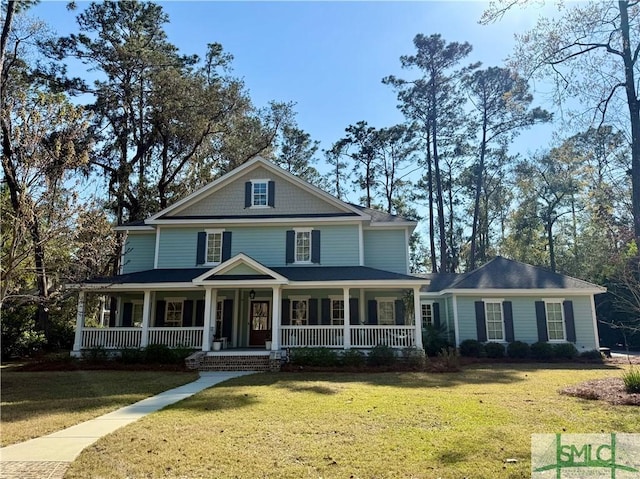 view of front facade with a porch and a front lawn