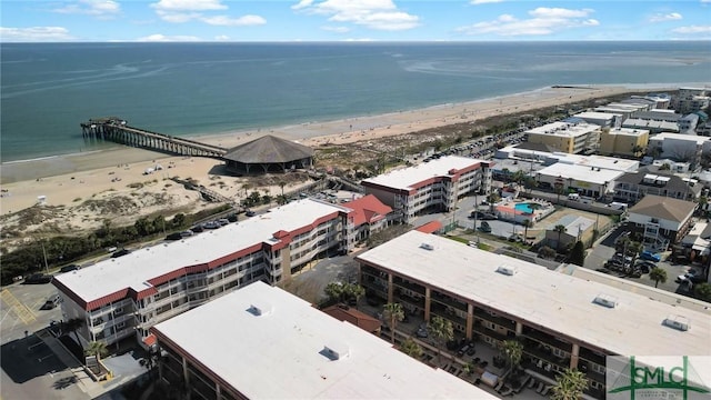 aerial view with a view of the beach and a water view