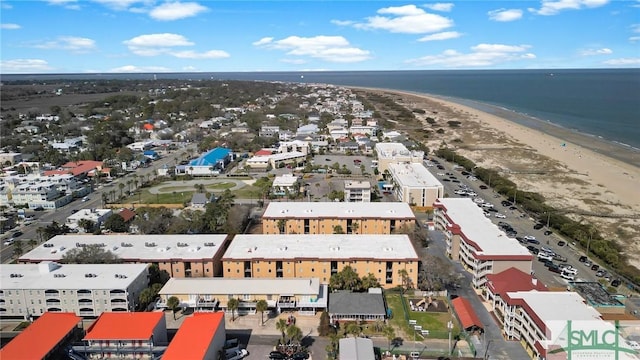 bird's eye view featuring a beach view and a water view