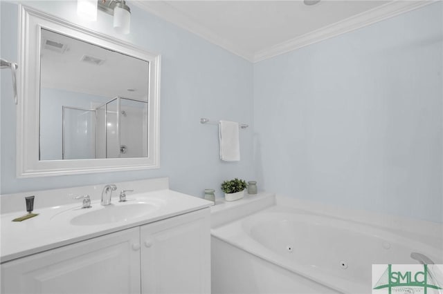 bathroom featuring vanity, visible vents, a stall shower, a whirlpool tub, and crown molding