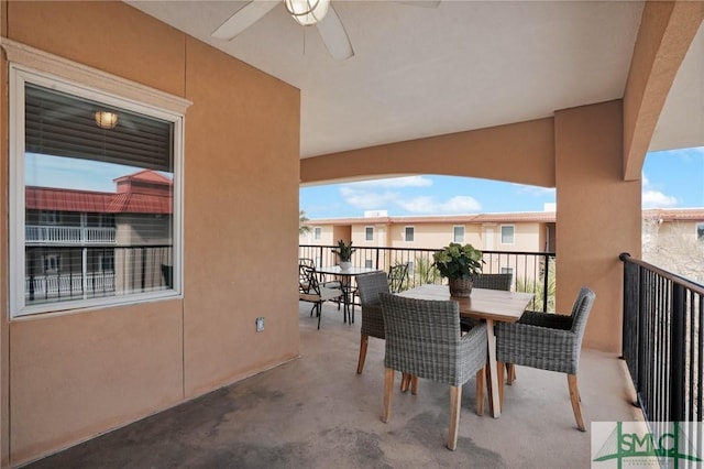 exterior space with ceiling fan and outdoor dining space