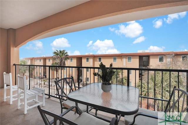 balcony featuring a residential view