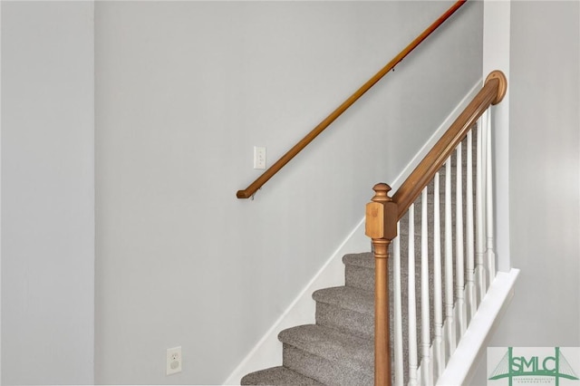 stairway with baseboards