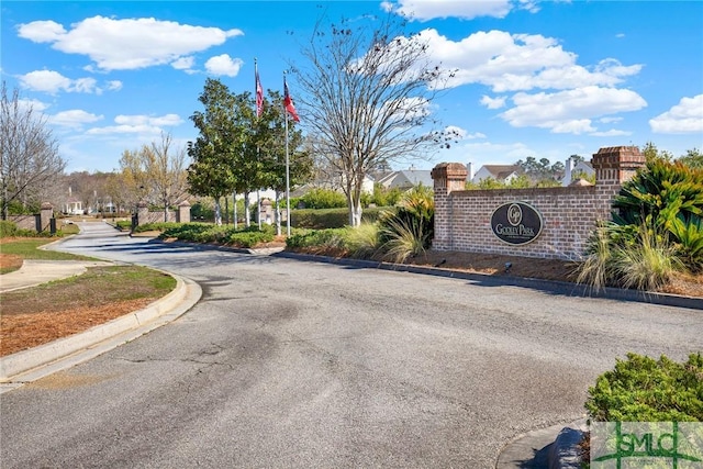 view of street featuring curbs