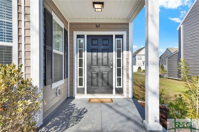 entrance to property with a porch