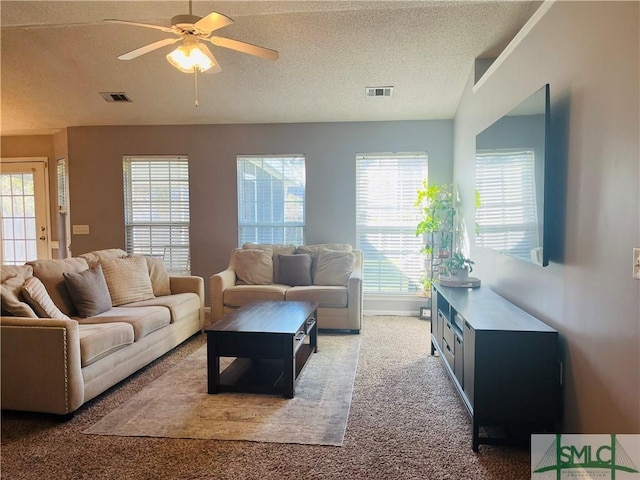 270 Lancaster Way, Richmond Hill, GA 31324 - living area featuring a ceiling fan, light colored carpet, visible vents, and a textured ceiling