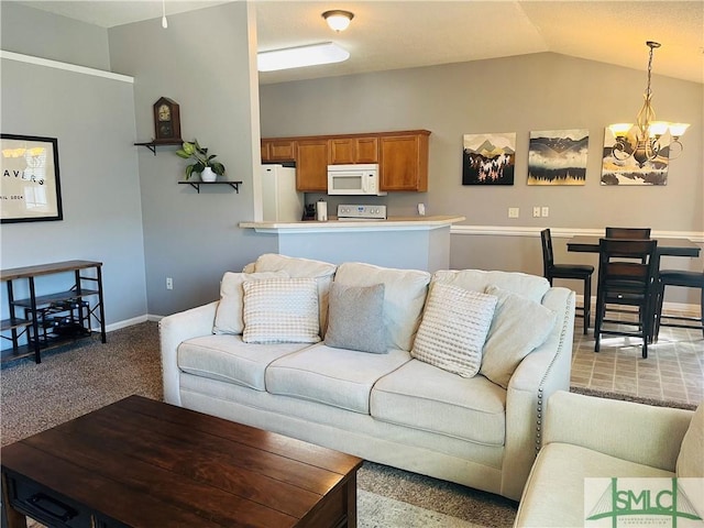 270 Lancaster Way, Richmond Hill, GA 31324 - living area featuring baseboards, lofted ceiling, a notable chandelier, and light carpet