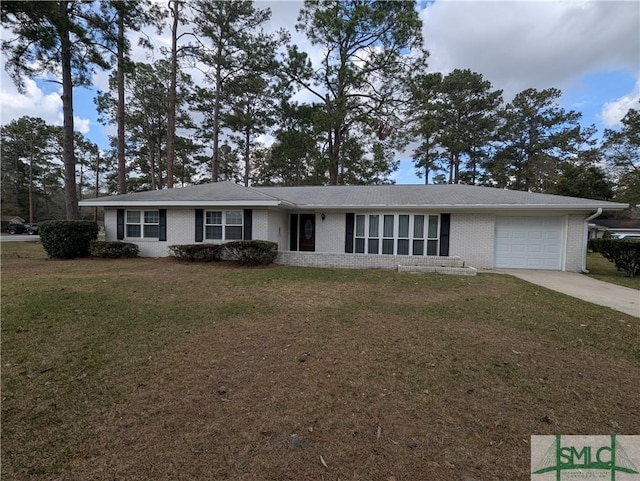 130 Westwood Dr, Rincon, GA 31326 - ranch-style home with a front lawn, concrete driveway, brick siding, and a garage