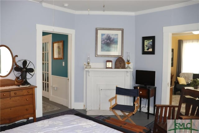 bedroom featuring crown molding