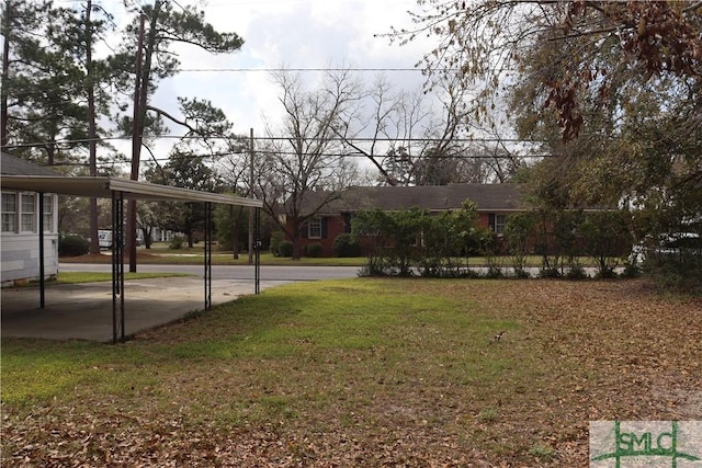 view of yard featuring a carport