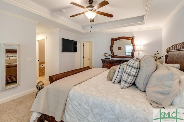 bedroom with ornamental molding, carpet floors, baseboards, and a raised ceiling