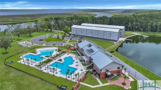 aerial view with a view of trees and a water view