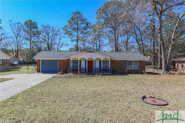 ranch-style home featuring driveway, brick siding, an attached garage, and a front lawn
