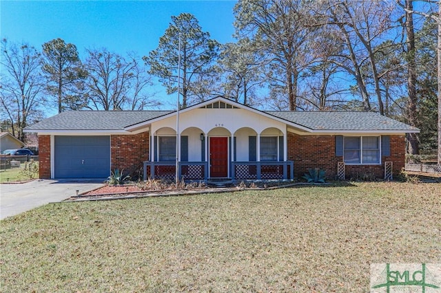 ranch-style home featuring driveway, a porch, an attached garage, a front yard, and brick siding