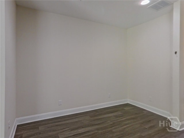 180 Kepler Loop, Richmond Hill, GA 31324 - empty room featuring dark wood-style flooring and baseboards