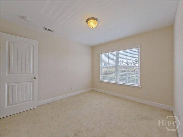 180 Kepler Loop, Richmond Hill, GA 31324 - carpeted spare room with baseboards and a smoke detector