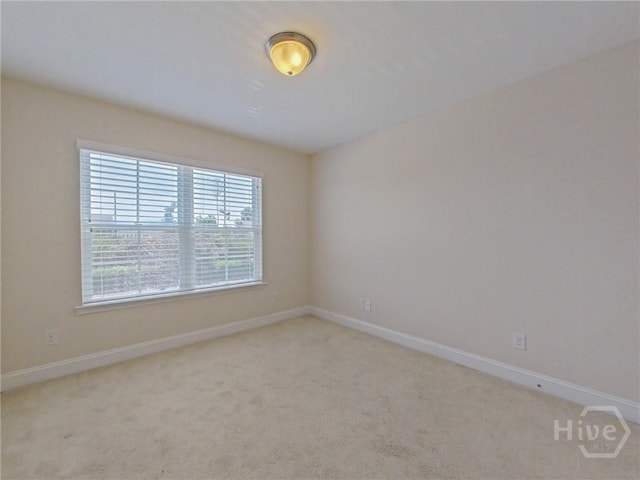 180 Kepler Loop, Richmond Hill, GA 31324 - unfurnished room with carpet floors and baseboards
