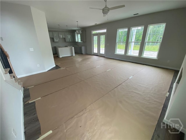152 Como Dr, Pooler, GA 31322 - unfurnished living room with a ceiling fan and stairway