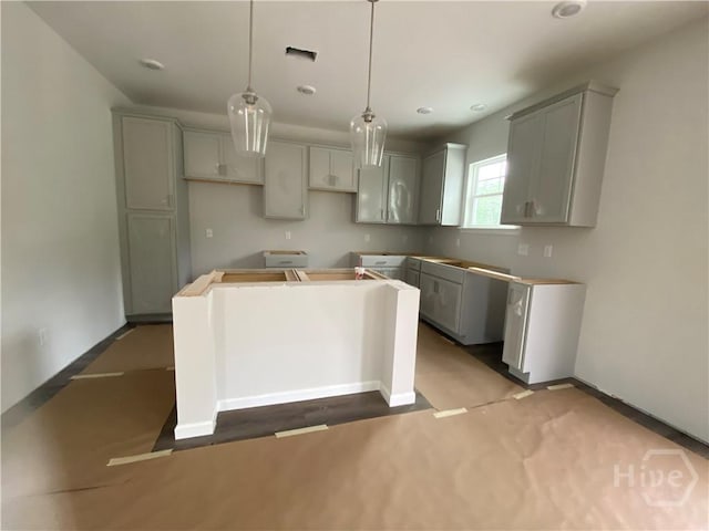 152 Como Dr, Pooler, GA 31322 - kitchen with a kitchen island, gray cabinetry, hanging light fixtures, and recessed lighting