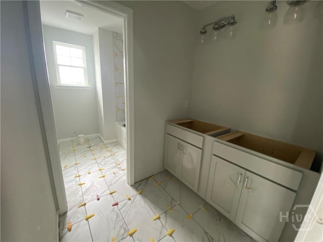 152 Como Dr, Pooler, GA 31322 - bathroom with marble look tiles and shower / bath combination