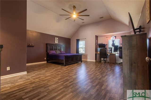 126 NE Owens St, Ludowici, GA 31316 - bedroom with visible vents, lofted ceiling, baseboards, and dark wood-style floors