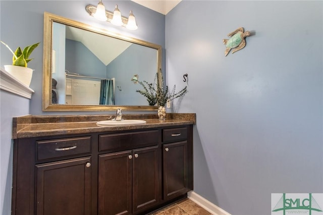 126 NE Owens St, Ludowici, GA 31316 - full bathroom featuring vanity, tile patterned floors, a shower with curtain, and baseboards