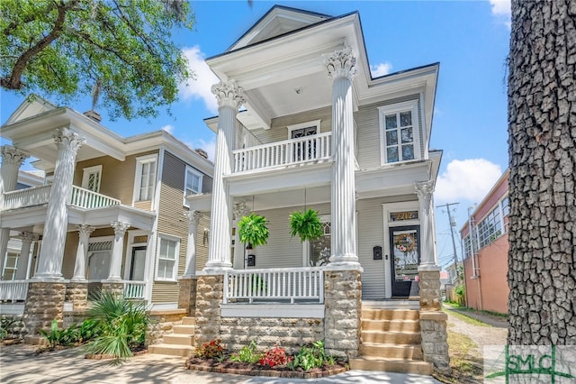 2210 Bull St, Savannah, GA 31401 - greek revival house featuring a balcony and a porch