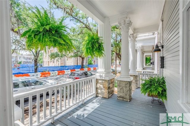 2210 Bull St, Savannah, GA 31401 - wooden terrace featuring covered porch