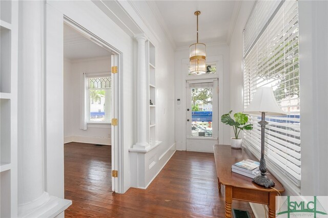 2210 Bull St, Savannah, GA 31401 - entryway with dark wood-style flooring, ornate columns, and ornamental molding
