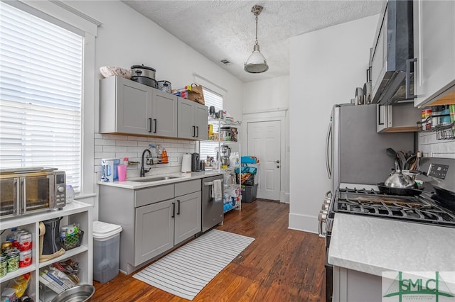 2210 Bull St, Savannah, GA 31401 - kitchen with a sink, stainless steel appliances, gray cabinetry, and light countertops