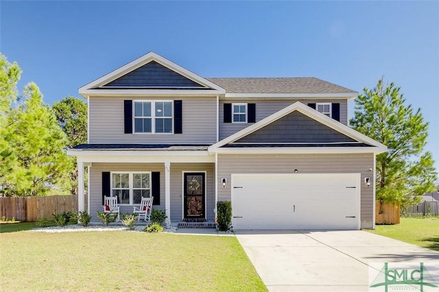 55 Saddlebrush Rd, Ellabell, GA 31308 - craftsman inspired home with a garage, a front yard, driveway, and fence