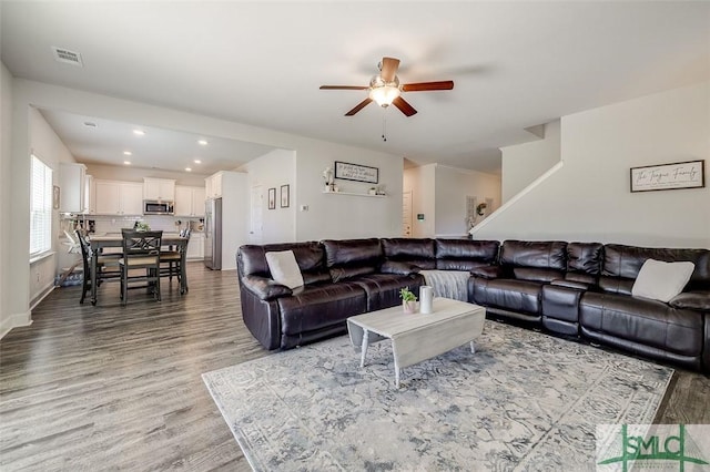 55 Saddlebrush Rd, Ellabell, GA 31308 - living area featuring ceiling fan, visible vents, recessed lighting, wood finished floors, and baseboards