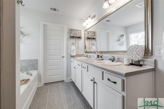 55 Saddlebrush Rd, Ellabell, GA 31308 - bathroom featuring a sink and visible vents