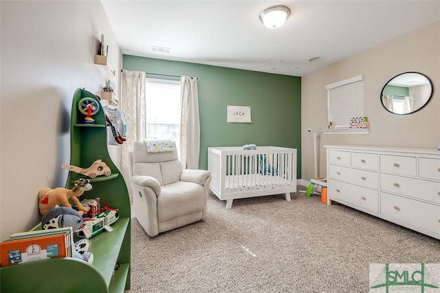 55 Saddlebrush Rd, Ellabell, GA 31308 - bedroom featuring carpet floors, visible vents, and a crib