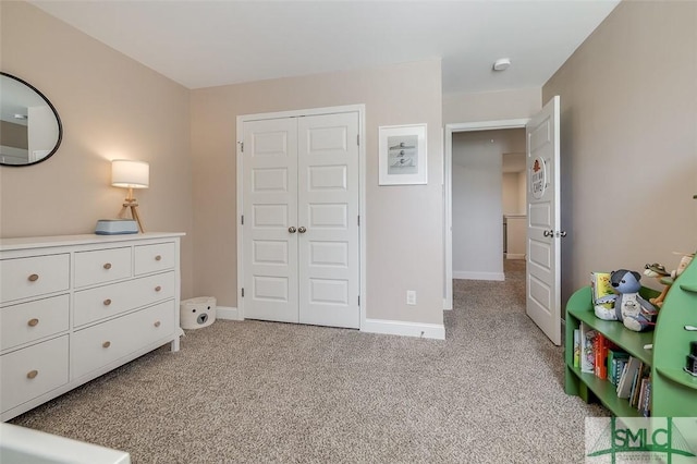 55 Saddlebrush Rd, Ellabell, GA 31308 - bedroom with a closet, light colored carpet, and baseboards