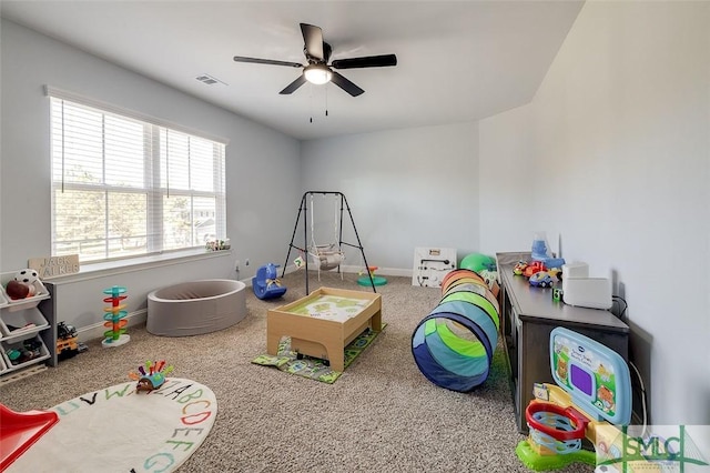 55 Saddlebrush Rd, Ellabell, GA 31308 - playroom featuring visible vents, baseboards, a ceiling fan, and carpet flooring