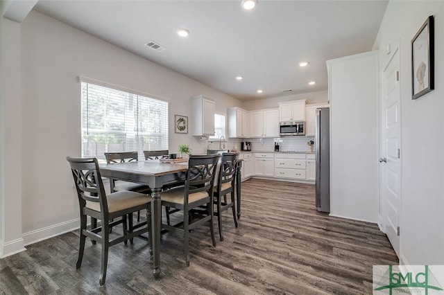 55 Saddlebrush Rd, Ellabell, GA 31308 - dining room featuring baseboards, dark wood finished floors, visible vents, and recessed lighting