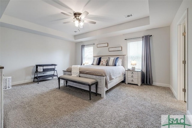 55 Saddlebrush Rd, Ellabell, GA 31308 - bedroom with visible vents, baseboards, a raised ceiling, and carpet