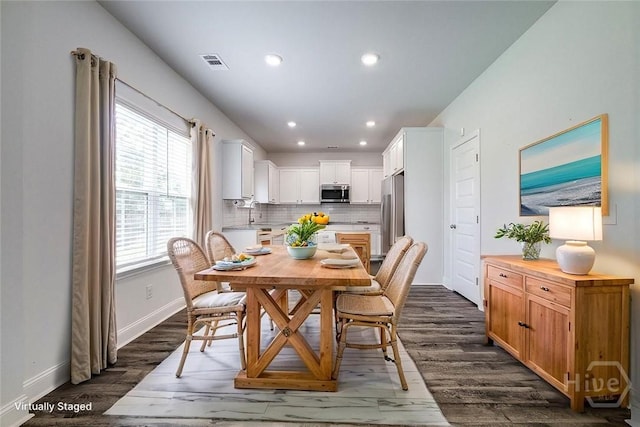55 Saddlebrush Rd, Ellabell, GA 31308 - dining space with dark wood-style flooring, baseboards, and recessed lighting