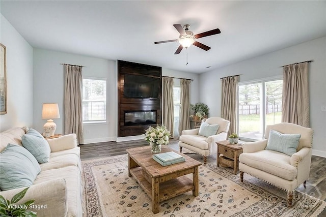 55 Saddlebrush Rd, Ellabell, GA 31308 - living room featuring plenty of natural light, baseboards, and ceiling fan