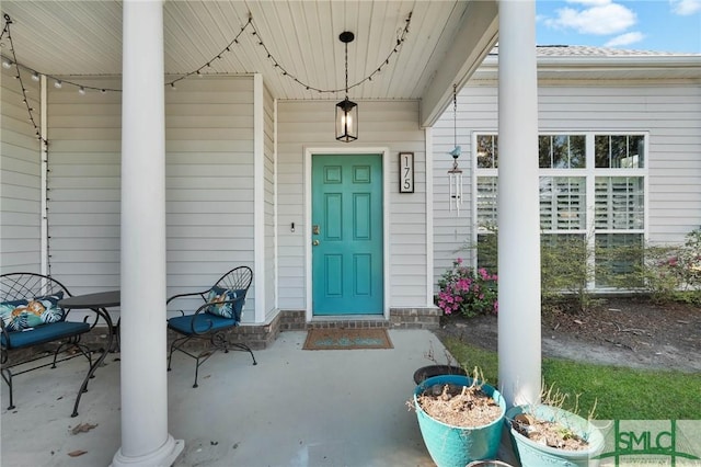 property entrance with a patio area