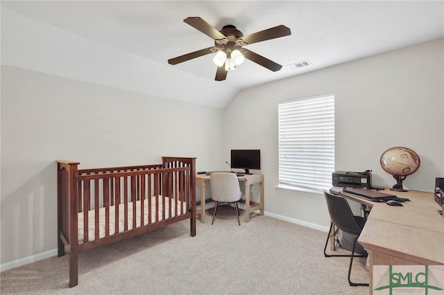 bedroom featuring visible vents, baseboards, ceiling fan, light colored carpet, and lofted ceiling