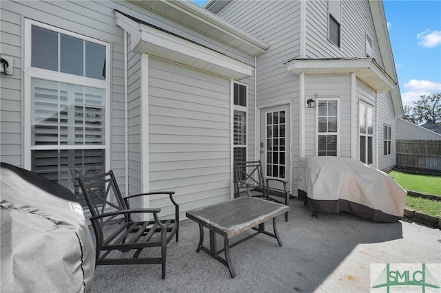 view of patio with fence