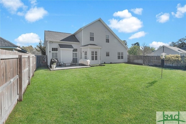 rear view of property with a patio, a fenced backyard, and a lawn