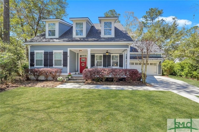 view of front facade with a front yard, a garage, covered porch, roof with shingles, and concrete driveway