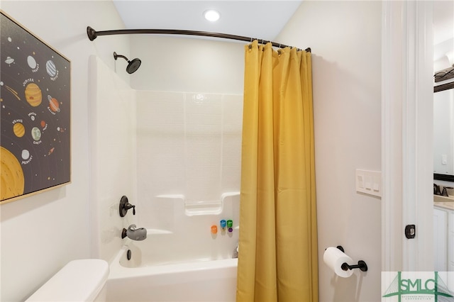 full bathroom featuring shower / bath combo, toilet, and recessed lighting