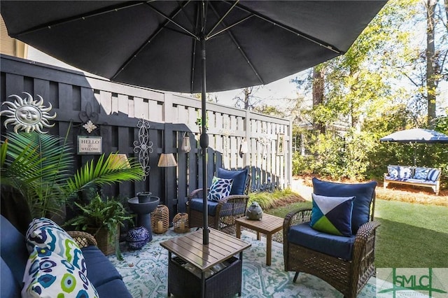117 Hope Ln Unit A, Savannah, GA 31406 - view of patio / terrace with an outdoor living space and fence