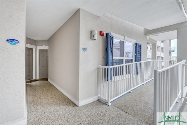 hallway with an upstairs landing