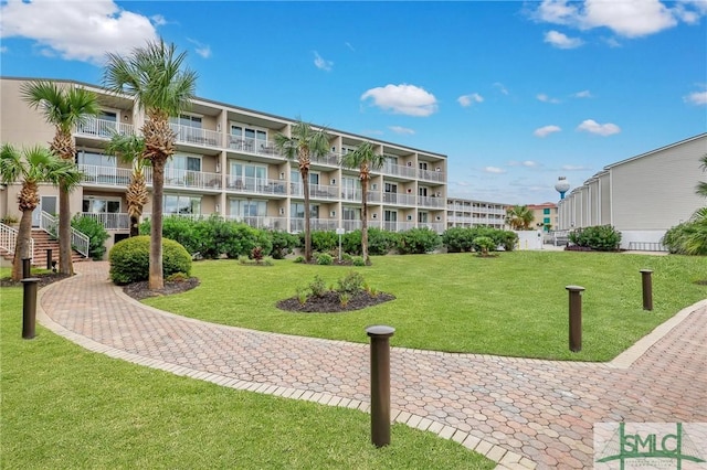 surrounding community with a lawn